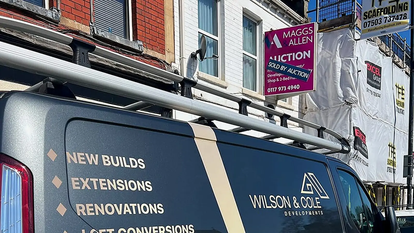 Wilson & Cole van parked outside a scaffolded Bristol terrace where our builders are working on a loft conversion