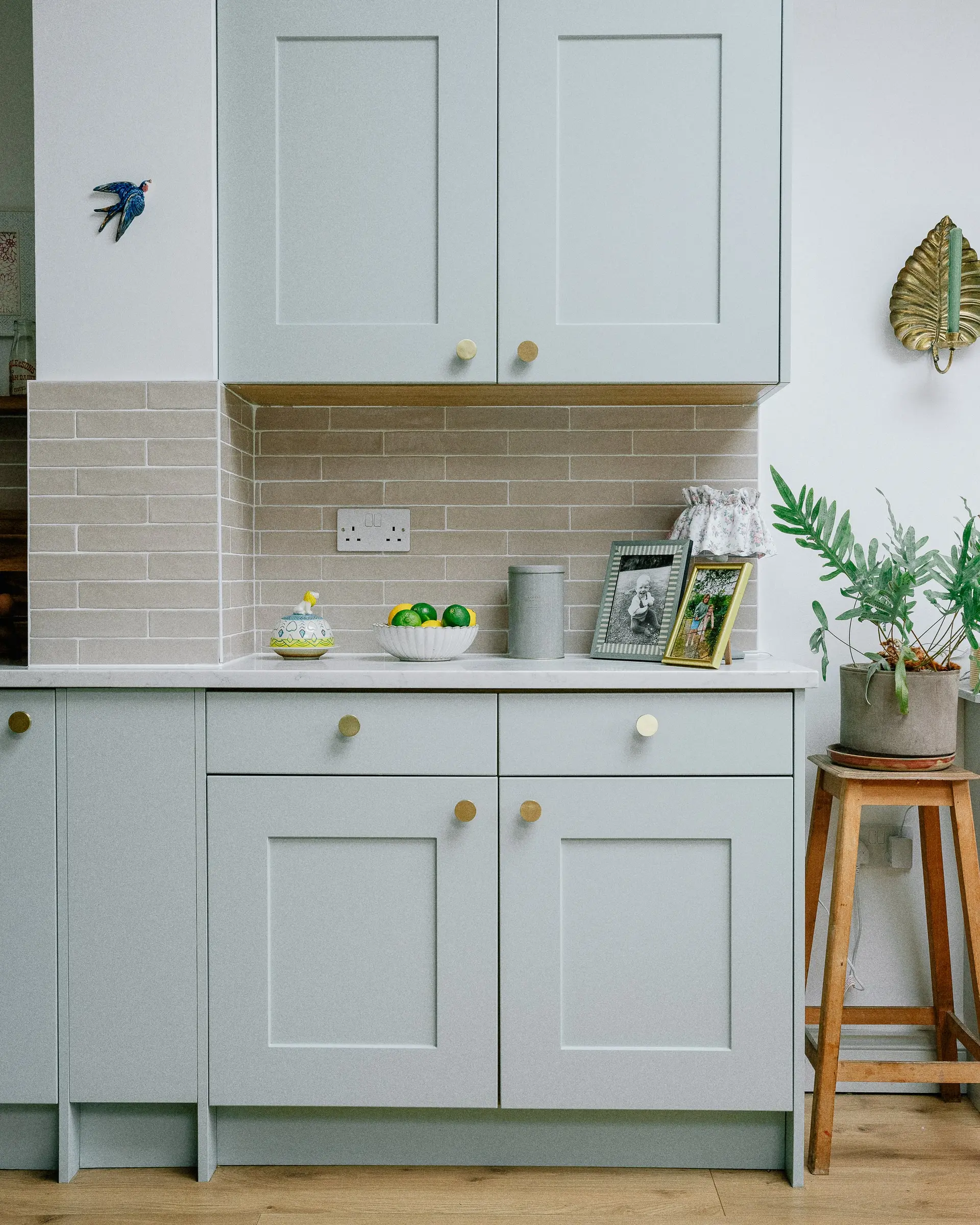 A duck-egg blue shaker kitchen designed by Anna Cordle